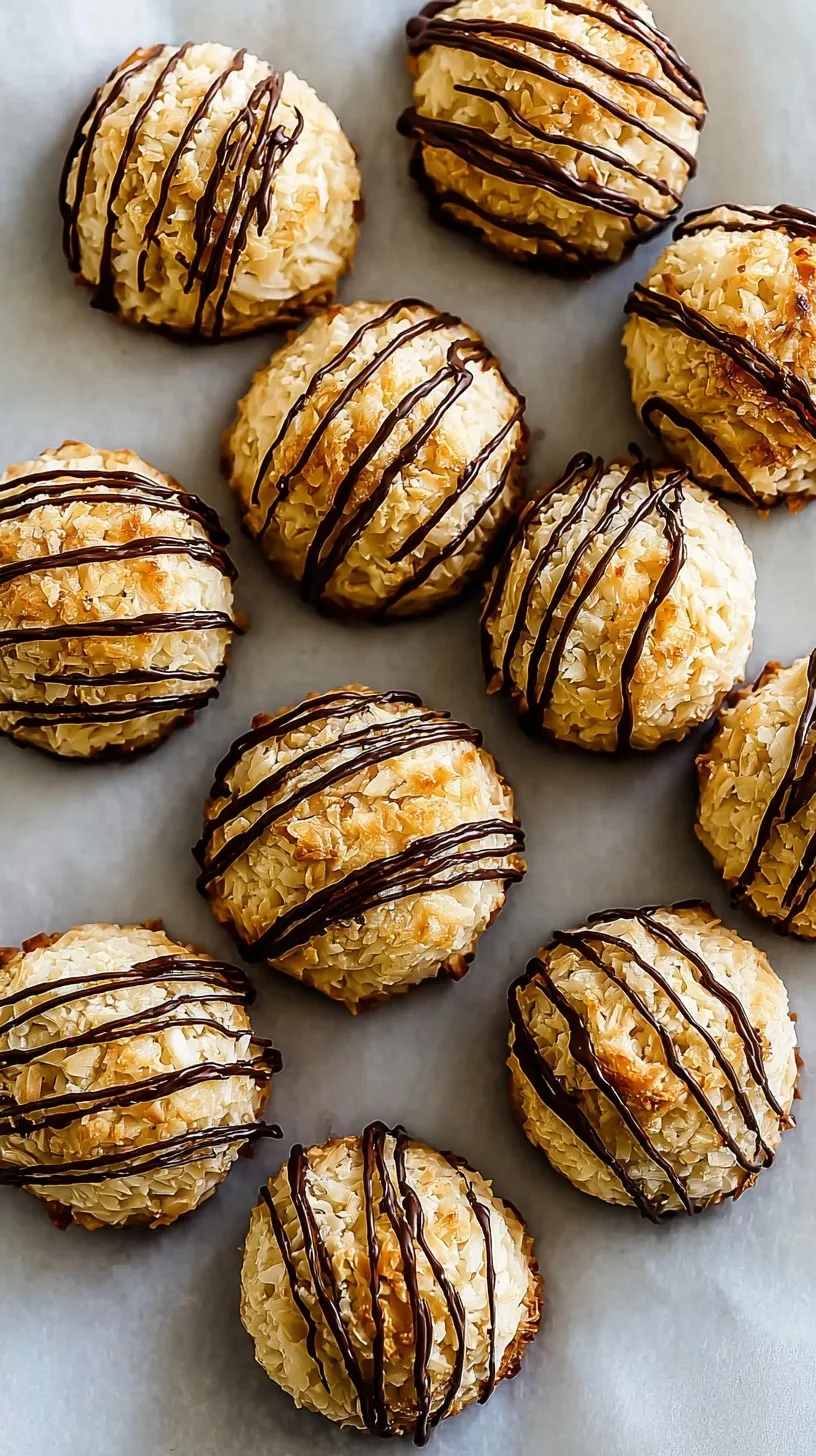A pile of golden brown coconut macaroons on a white platter