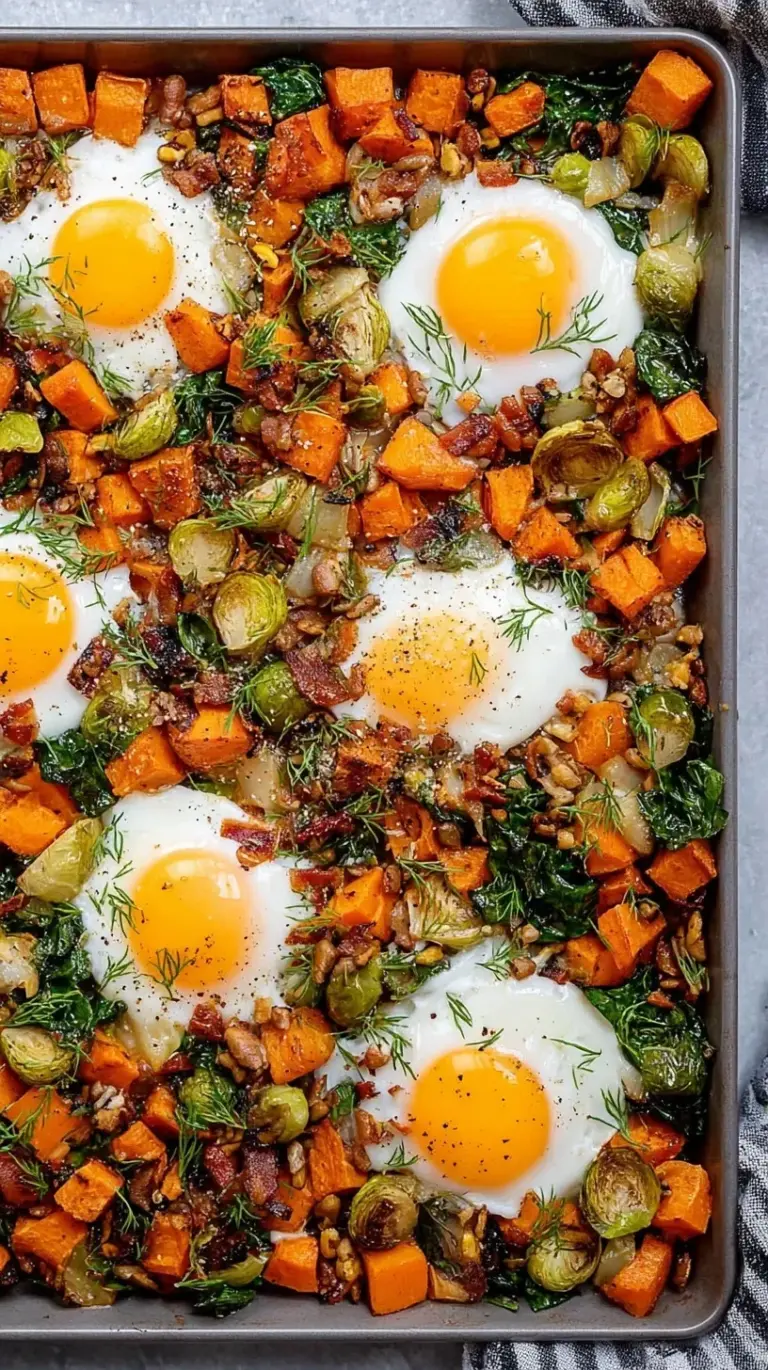 A cast iron skillet filled with golden-brown sweet potato cubes, red peppers, and onions garnished with fresh parsley.